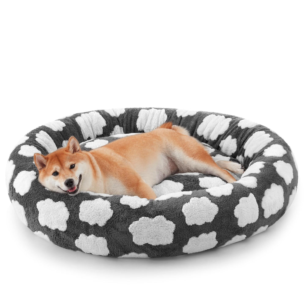 JOEJOY Donut Bed sits in a cozy living room, inviting pets to curl up for warmth.