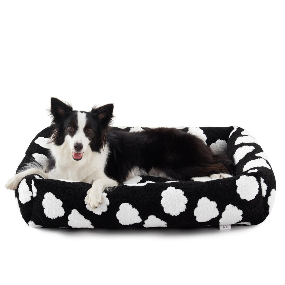 JOEJOY Medium Dog Bed cloud-pattern shows plush comfort for restful naps.