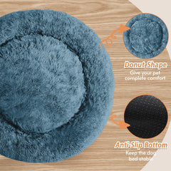 JOLLYVOGUE Calming Dog Bed raised rim supports head and neck during naps.