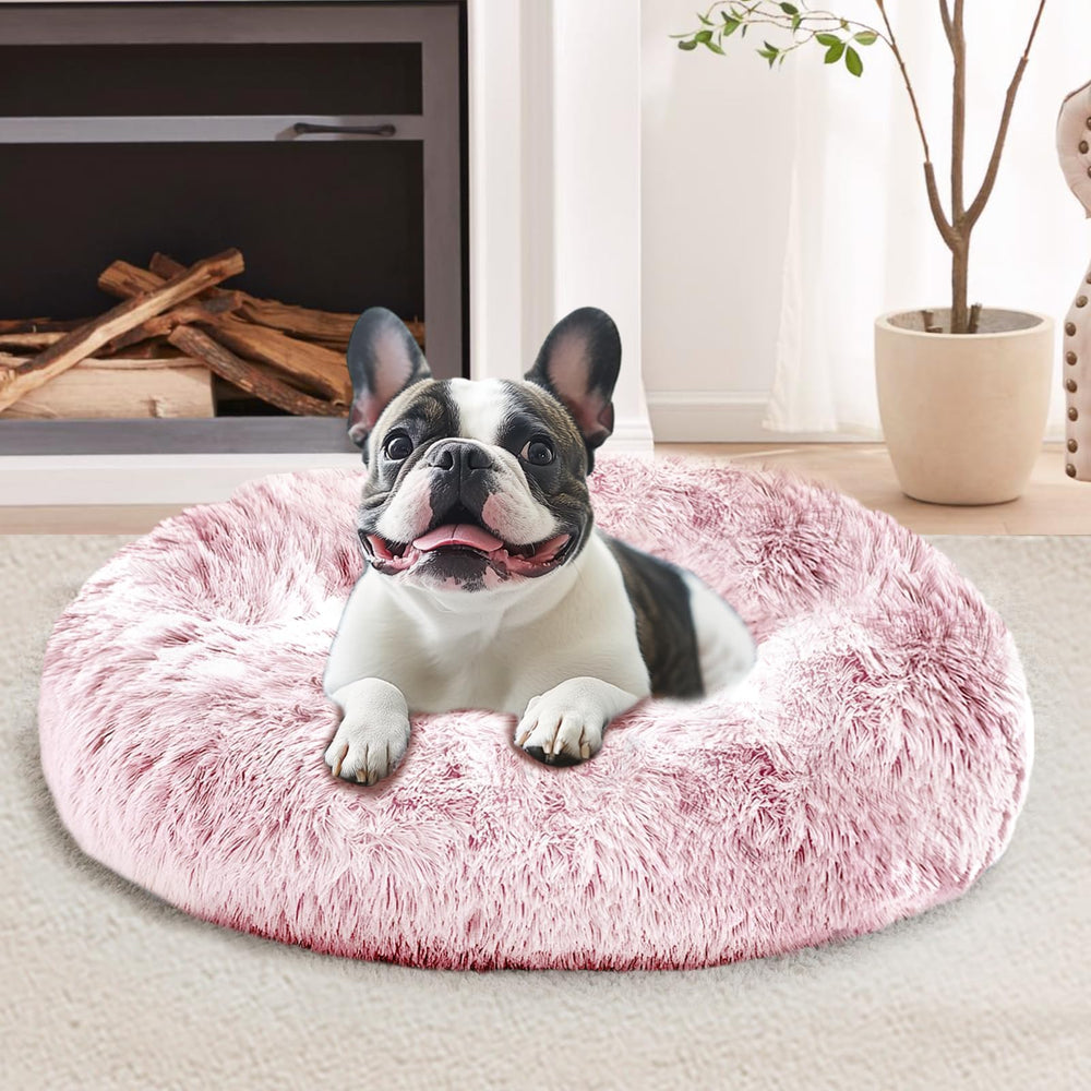 JOLLYVOGUE calming donut bed with soft fur offers a cozy retreat for small pets.