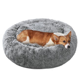 JOLLYVOGUE donut dog bed outer view highlights plush warmth for curling up and comfort.