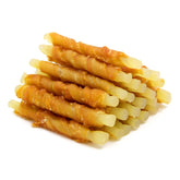 Jungle Calling rawhide-free chicken-wrapped cod-stick image; protein-packed chew for training rewards.