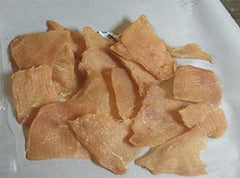 Just Jerky Treats chicken breast close-up shows real meat and simple ingredients