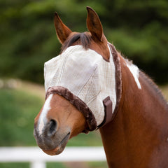 Kensington Fly Mask chin-strap shows secure fit during activity.