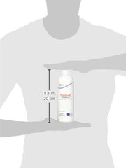Horse in field with Nano-E bottle illustrates potential muscle and reproductive support.