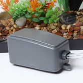 Koller Products Aqua Lift pump in use for precise water transfers up to 24 inches.