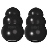 KONG Extreme black rubber dog toy in action during fetch for powerful chewers