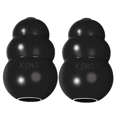 KONG Extreme black rubber dog toy in action during fetch for powerful chewers
