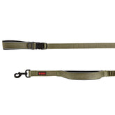 KONG reflective shock-absorbing hands-free dog leash enhances night visibility during walks.