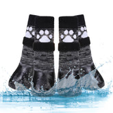 Kooltail non-slip dog socks show paw grip for secure indoor traction.