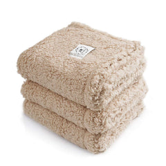 Luciphia calming blanket in the living room for cozy pet lounging.