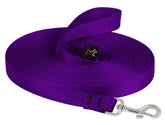 LupinePet Basics purple 30-foot training leash extended for long-distance recall practice