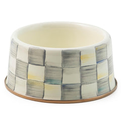 MacKenzie-Childs pet bowl gray-check closeup highlighting durable steel underbody