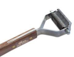 Mars Coat King blunt dematting rake in action removing loose hair during grooming