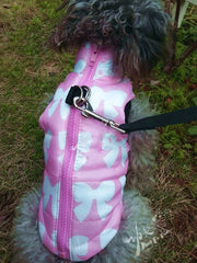 MaruPet pink XS winter vest chest-strap close-up demonstrating secure fit for wind protection.