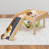 MEWTOGO guinea pig hammock platform on wooden legs offers secure play space.