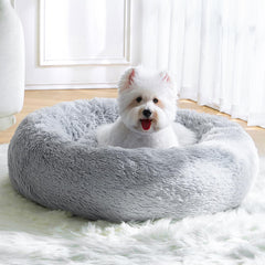 MNWHUC calming small dog bed with donut design for cozy naps and security.