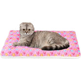 Mora Pets crate pad pink star print, top view showing cozy fleece for small pets.