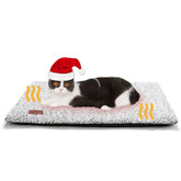 Mora Pets self-warming bed cover close-up showing carbon-infused warmth.