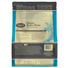 Muenster Ancient Grains Ocean Fish kibble closeup shows small-breed size for easy chewing.