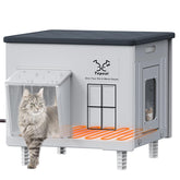 Myodal indestructible heated cat house outside assembly shows quick setup for outdoor warmth.
