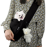 NATUYA small dog carrier sling in black canvas for hands-free outings.