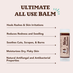 Natural Dog Company Skin Soother Bundle travel-stick being applied to a dog's paw for moisturization.