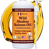 Natural Dog Company Wild Alaskan Salmon Oil bottle pouring onto dog food for shine