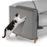 NATUYA cat scratch protector on all-gray sofa armrest for durable protection.