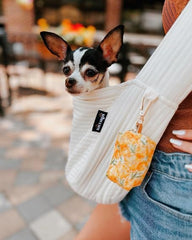 NATUYA dog sling wide shoulder strap close-up shows comfortable weight distribution