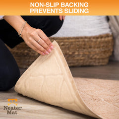 Neater Pets Neater Mat floor protection keeps mess contained.