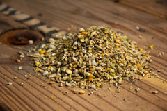 New Country Organics olive-oil-layer-feed-eggs boosts omega-3 content.
