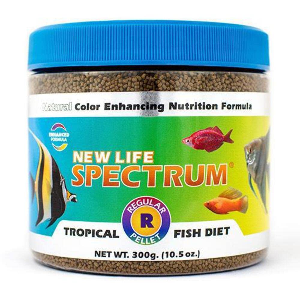 New Life Spectrum Regular 300g pellets sinking in aquarium for bottom-dwelling tropical fish.