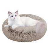 Nisrada cat bed indoor-donut-design provides secure lounging and head support.