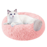 Nisrada round donut bed offers cozy security for indoor cats.