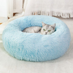 Nisrada round pet bed with donut design for secure, cozy resting.