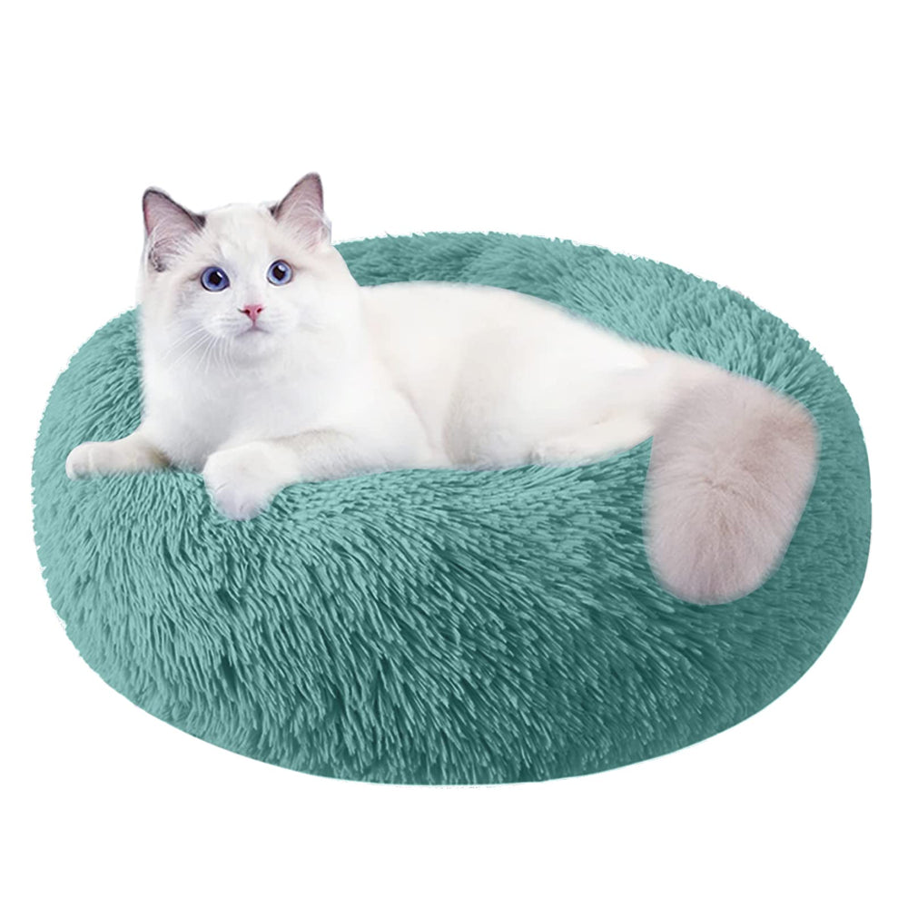 Nisrada round pet bed with raised edges provides secure, restful sleep.