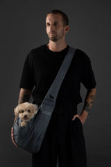 Noah & Paw dog sling carrier adjustable strap close-up for customized fit during long walks.