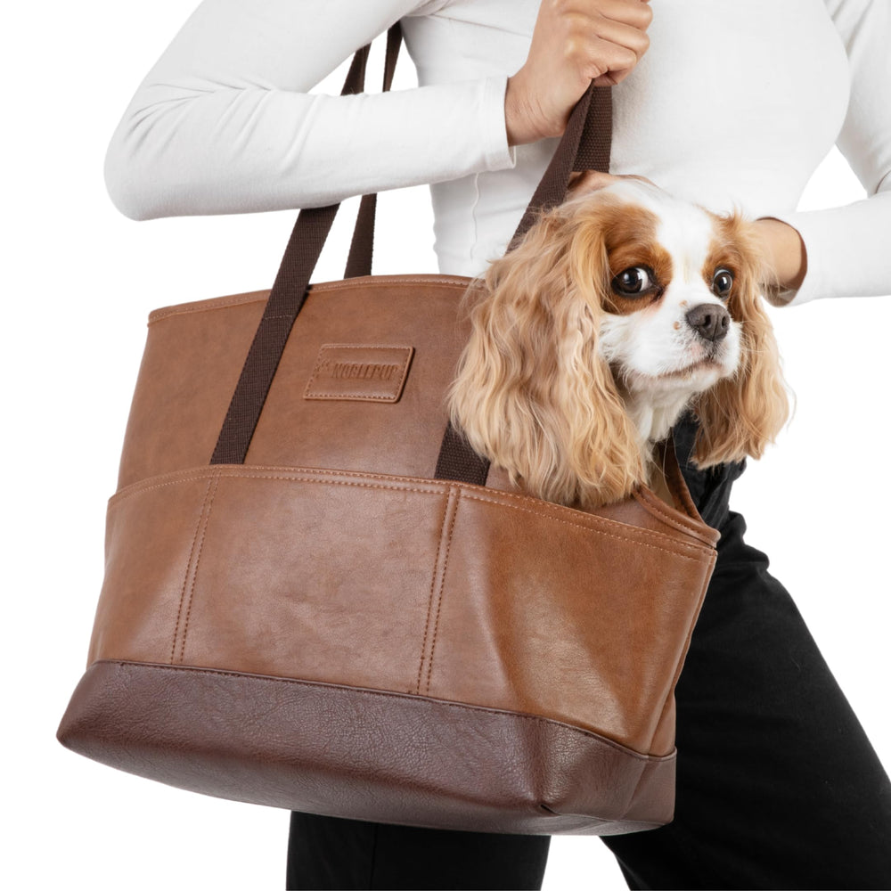 NoblePup faux leather carrier close-up highlights compact small-dog fit and stylish design.