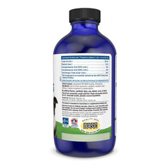 Nordic Naturals Omega-3 Pet unflavored liquid poured over dog food for easy dosing.