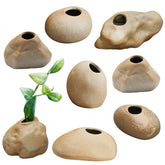 Norme 8 piece ceramic aquarium plant pots set arranged for vibrant underwater display