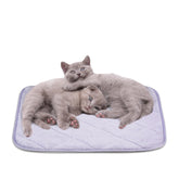 NWK Fluffy Self-Warming Cat Mat purple on sofa for cozy naps.
