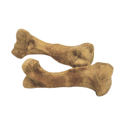 Nylabone Beef Broth Bones dog enjoying a savory reward chew.