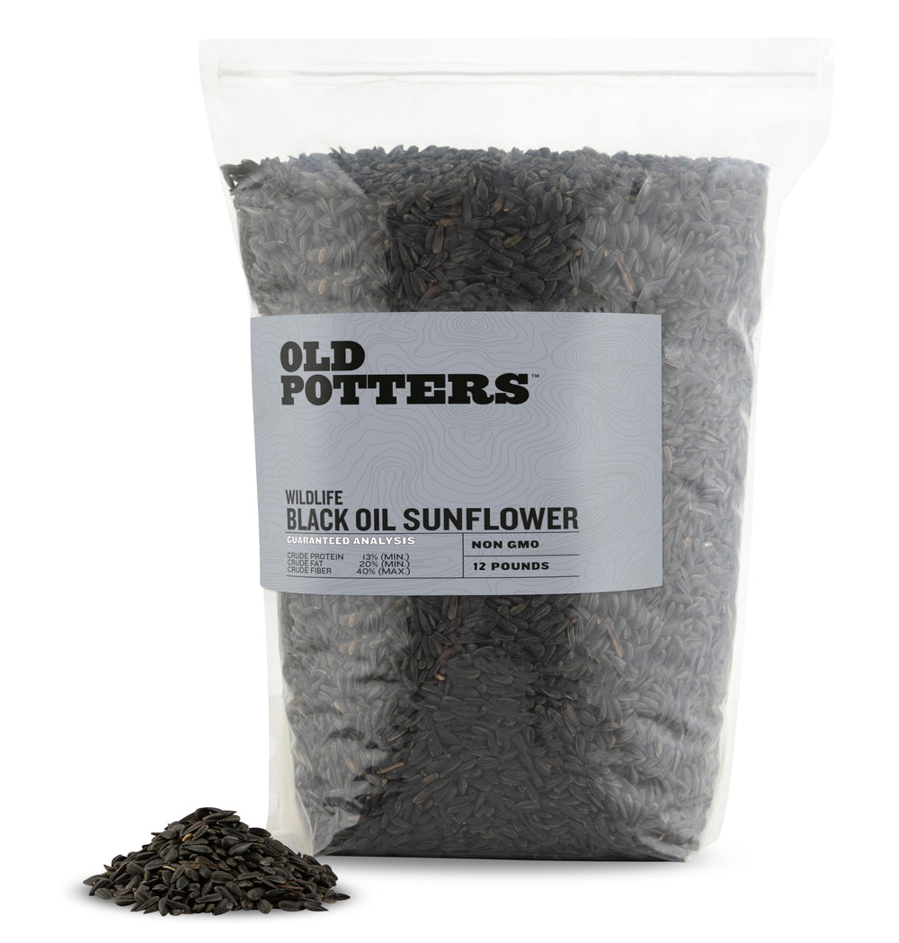 Old Potters Wildlife black oil sunflower seeds in a feeder attract diverse backyard birds