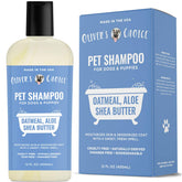 OLIVER'S CHOICE champú para perros: botella con etiqueta de avena y aloe, aroma suave.