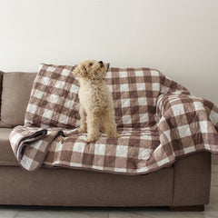 Omilu waterproof dog blanket couch-protector keeps furniture dry during playful pets.