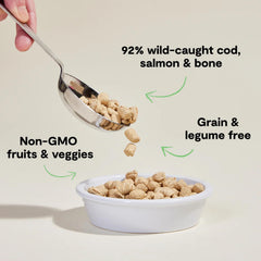 Open Farm morsels being poured into a bowl for easy topping