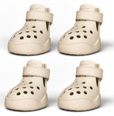 PawPosh dog shoes beige non-slip waterproof on pavement for secure outdoor walking.