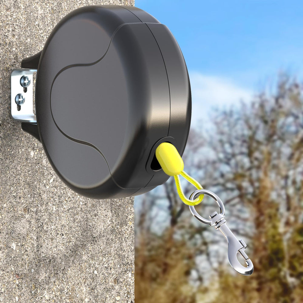 PAWSTATION 30ft wall-mount installation shows secure outdoor tie-out for safe yard access.