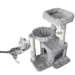 Pesofer cat tree top perch provides high vantage lounging for curious cats.